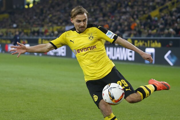 DORTMUND, GERMANY - FEBRUARY 28:  Marcel Schmelzer of Borussia Dortmund runs with the ball during the Bundesliga match between Borussia Dortmund and 1899 Hoffenheim at Signal Iduna Park on February 28, 2016 in Dortmund, Germany.  (Photo by Boris Streubel/Getty Images)