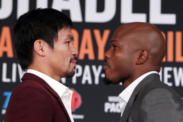 Manny Pacquiao (L) faces Timothy Bradley (R) during a press conference announcing their upcoming 12-round world welterweight championship at the Beverly Hills Hotel in Beverly Hills, California, January 19, 2016.
Manny Pacquiao said he is looking forward to swapping the boxing ring for the political arena as the countdown began towards his farewell fight with long-time American rival Timothey Bradley on April9, 2016.  / AFP / Chris Farina        (Photo credit should read CHRIS FARINA/AFP/Getty Images)