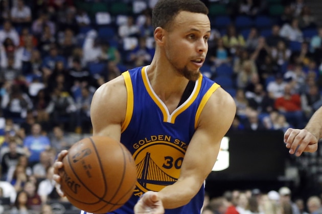 Golden State Warriors’ Stephen Curry   plays against the Minnesota Timberwolves in the first quarter of an NBA basketball game Monday, March 21, 2016, in Minneapolis. (AP Photo/Jim Mone)