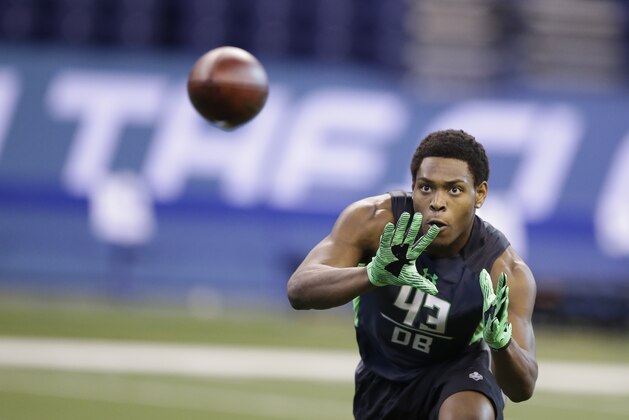 Florida State defensive back Jalen Ramsey runs a drill at the NFL football scouting combine on Monday, Feb. 29, 2016, in Indianapolis. (AP Photo/Darron Cummings)