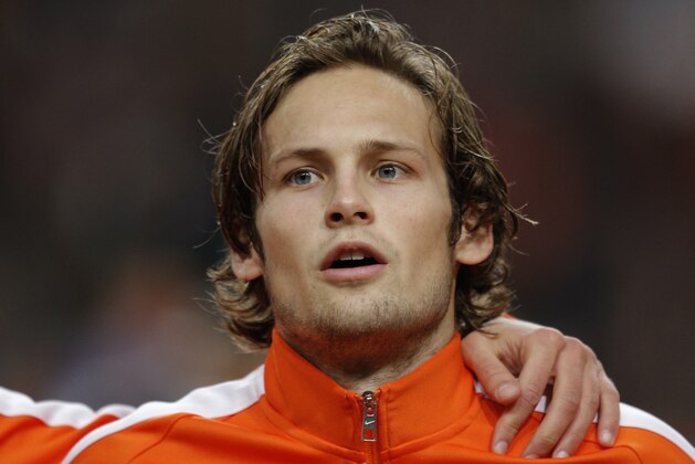 Netherlands' Daley Blind sings the national anthem at the start of the Euro 2016 group A qualifying round soccer match between the Netherlands and Latvia at ArenA stadium in Amsterdam, Netherlands, Sunday, Nov. 16, 2014. Manchester United midfielder Blind could face a lengthy lay-off after injuring his knee playing for the Netherlands against Latvia on Sunday. Coach Guus Hiddink says Blind likely twisted or possibly ruptured a medial ligament in his knee in a challenge with in a challenge with Eduards Visnakovs.(AP Photo/Peter Dejong)