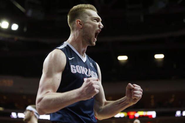 Gonzaga forward Domantas Sabonis celebrates as his team leads Saint Mary's with seconds left in an NCAA college basketball game for the West Coast Conference men's tournament championship Tuesday, March 8, 2016, in Las Vegas. Gonzaga won 85-75. (AP Photo/John Locher)