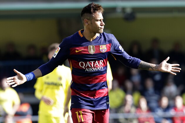 Barcelona's Neymar celebrates after scoring during the Spanish La Liga soccer match between Villarreal and Barcelona at the Madrigal stadium in Villarreal, Spain, Sunday, March 20, 2016. (AP Photo/Alberto Saiz)