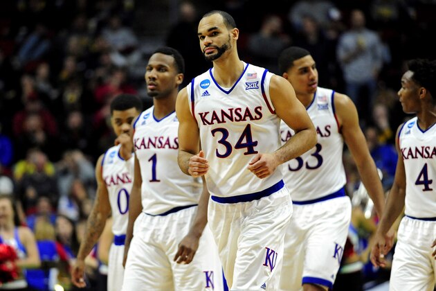 Mar 19, 2016; Des Moines, IA, USA; Kansas Jayhawks forward Perry Ellis (34) runs onto the court in the second half against the Connecticut Huskies during the second round of the 2016 NCAA Tournament at Wells Fargo Arena. Mandatory Credit: Jeffrey Becker-USA TODAY Sports