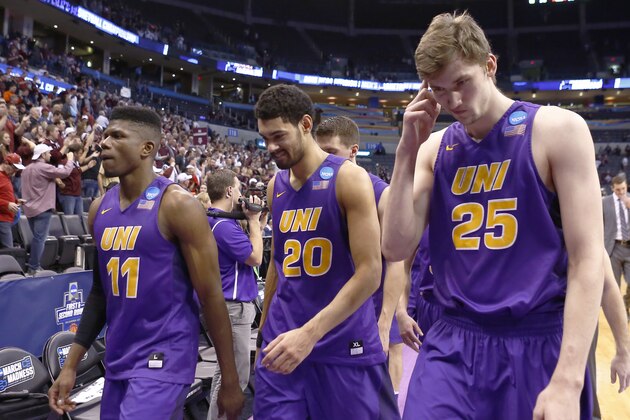 Northern Iowa guard Wes Washpun (11), guard Jeremy Morgan (20) and forward Bennett Koch (25) walk off the court after losing to Texas A&M in a second-round men's college basketball game in the NCAA Tournament in Oklahoma City, Sunday, March 20, 2016. Texas A&M won in double overtime 92-88. (AP Photo/Alonzo Adams)