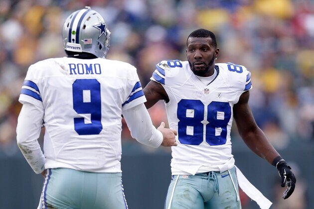 GREEN BAY, WI - JANUARY 11:  Quarterback  Tony Romo #9 and  Dez Bryant #88 of the Dallas Cowboys react during the 2015 NFC Divisional Playoff game against the Green Bay Packers at Lambeau Field on January 11, 2015 in Green Bay, Wisconsin.  (Photo by Mike McGinnis/Getty Images)