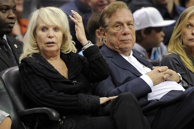 FILE - In this Nov. 12, 2010, file photo, Shelly Sterling sits with her husband, Donald Sterling, right, during the Los Angeles Clippers' NBA basketball game against the Detroit Pistons in Los Angeles. Former Los Angeles Clippers owner Donald Sterling and his wife Shelly Sterling have decided to stay in their six-decade marriage. (AP Photo/Mark J. Terrill, File)
