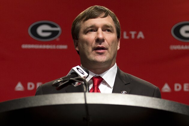 Alabama defensive coordinator Kirby Smart speaks during a press conference where he was introduced as Georgia's new head football coach  Monday, Dec. 7, 2015, in Athens, Ga. Smart will stay with the Crimson Tide through the NCAA college playoffs. (AP Photo/John Bazemore)