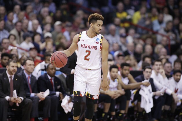 Maryland guard Melo Trimble (2) dribbles the ball during the second half of a second-round men's college basketball game against Hawaii in the NCAA Tournament in Spokane, Wash., Sunday, March 20, 2016. (AP Photo/Young Kwak)