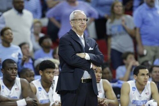 North Carolina head coach Roy Williams watches play against Providence during the first half of a second-round men's college basketball game in the NCAA Tournament, Saturday, March 19, 2016, in Raleigh, N.C. (AP Photo/Chuck Burton)