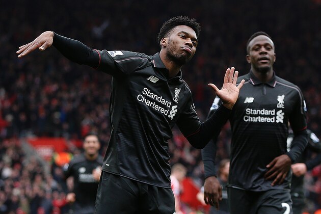 Liverpool's English striker Daniel Sturridge (L) dances as he celebrates scoring his team's second goal during the English Premier League football match between Southampton and Liverpool at St Mary's Stadium in Southampton, southern England on March 20, 2016. / AFP / ADRIAN DENNIS / RESTRICTED TO EDITORIAL USE. No use with unauthorized audio, video, data, fixture lists, club/league logos or 'live' services. Online in-match use limited to 75 images, no video emulation. No use in betting, games or single club/league/player publications.  /         (Photo credit should read ADRIAN DENNIS/AFP/Getty Images)