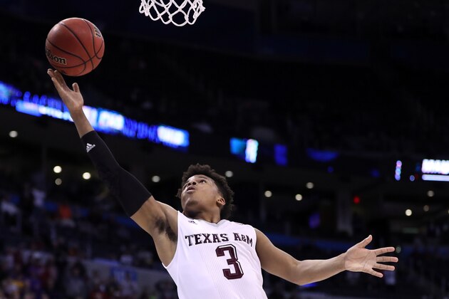 OKLAHOMA CITY, OK - MARCH 20:  Admon Gilder #3 of the Texas A&M Aggies makes a layup to tie the game with a score of 71 to 71 to bring them into overtime against the Northern Iowa Panthers during the second round of the 2016 NCAA Men's Basketball Tournament at Chesapeake Energy Arena on March 20, 2016 in Oklahoma City, Oklahoma.  (Photo by Ronald Martinez/Getty Images)