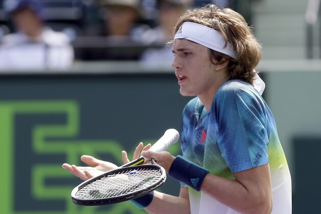 Alexander Zverev, of Germany, questions a call during the Miami Open tennis match against Michael Mmoh in Key Biscayne, Fla., Wednesday, March 23, 2016. (AP Photo/Alan Diaz)