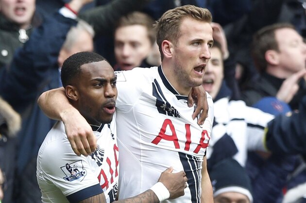 Tottenham Hotspur's Danny Rose, left, celebrates with Harry Kane after Kane scored his side's second goal during the English Premier League soccer match between Tottenham Hotspur and Arsenal at the White Hart Lane stadium in London, Saturday, March, 5, 2016. (AP Photo/Alastair Grant)