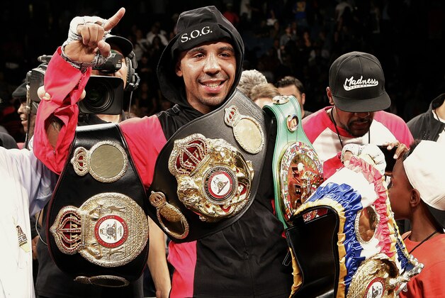 Andre Ward celebrates after defeating Paul Smith in a cruiserweight boxing match in Oakland, Calif., Saturday, June 20, 2015. Ward won when Smith's corner threw in the towel in the ninth round. (AP Photo/Jeff Chiu)
