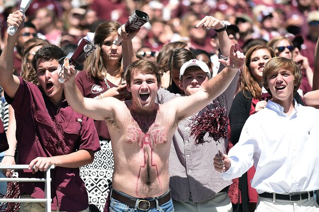 STARKVILLE, MS - OCTOBER 04:  Fans of the Mississippi State Bulldogs cheer for their team during a game against the Texas A&M Aggiesat Davis Wade Stadium on October 4, 2014 in Starkville, Mississippi.  Mississippi State won the game 48-31.  (Photo by Stacy Revere/Getty Images)