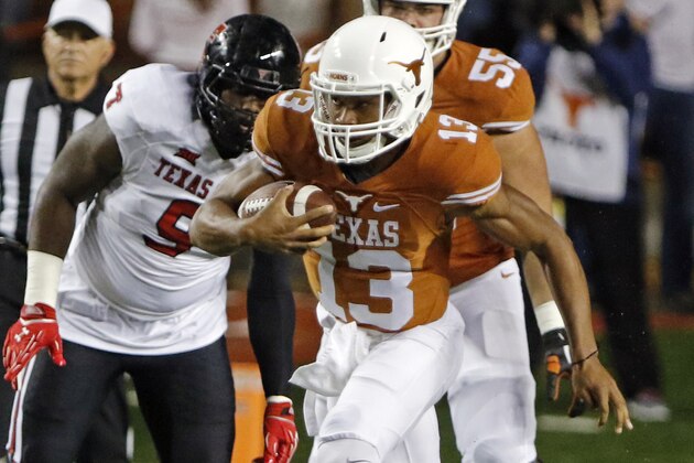 Texas quarterback Jerrod Heard (13) runs during the first half of an NCAA college football game against Texas Tech, Thursday, Nov. 26, 2015, in Austin, Texas. (AP Photo/Michael Thomas)