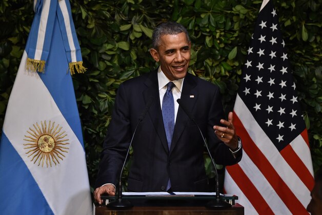 US President Barack Obama delivers a speech during a state dinner with Argentine President Mauricio Macri at the Kirchner Cultural Centre in Buenos Aires on March 23, 2016. The United States and Argentina sealed a major trade deal on the eve -the first day of President Barack Obama's visit- bolstering the efforts of his counterpart to end a decade-and-a-half of international financial isolation.   AFP PHOTO / NICHOLAS KAMM / AFP / NICHOLAS KAMM        (Photo credit should read NICHOLAS KAMM/AFP/Getty Images)
