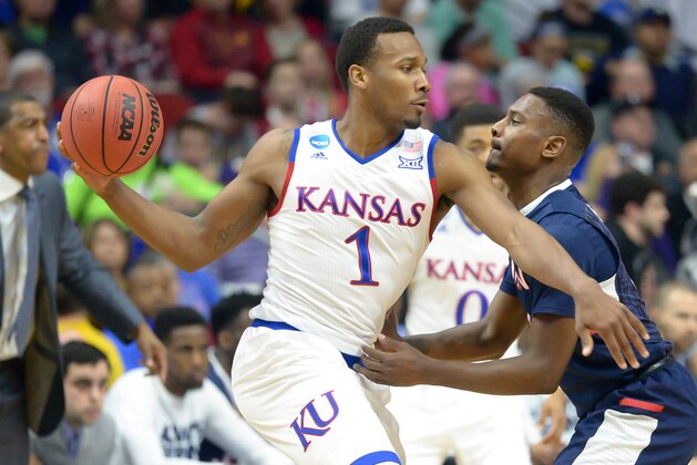 Mar 19, 2016; Des Moines, IA, USA; Kansas Jayhawks guard Wayne Selden Jr. (1) looks to drive against the Connecticut Huskies during the second round of the 2016 NCAA Tournament at Wells Fargo Arena. Mandatory Credit: Steven Branscombe-USA TODAY Sports