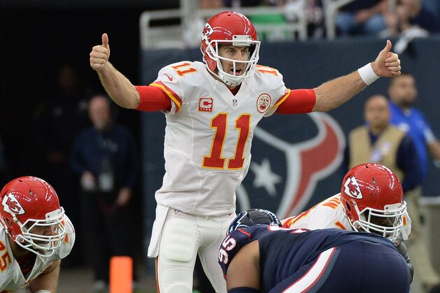 Kansas City Chiefs quarterback Alex Smith (11) calls a play during the first half of an NFL wild-card playoff football game against the Houston Texans, Saturday, Jan. 9, 2016, in Houston. (AP Photo/George Bridges)