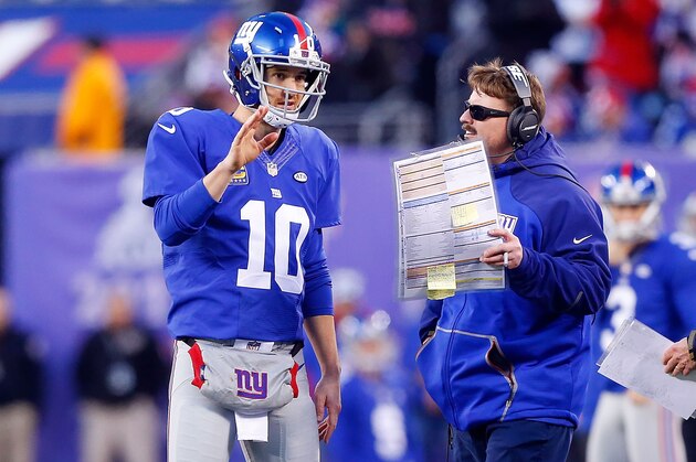 EAST RUTHERFORD, NJ - DECEMBER 20:  (NEW YORK DAILIES OUT)    Eli Manning #10 of the New York Giants talks with offensive coordinator Ben McAdoo during a game against the Carolina Panthers on December 20, 2015 at MetLife Stadium in East Rutherford, New Jersey. The Panthers defeated the Giants 38-35.  (Photo by Jim McIsaac/Getty Images)