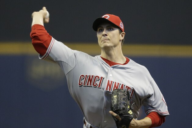 Cincinnati Reds starting pitcher Homer Bailey throws to the Milwaukee Brewers during the first inning of a baseball game Thursday, April 23, 2015, in Milwaukee. (AP Photo/Jeffrey Phelps)