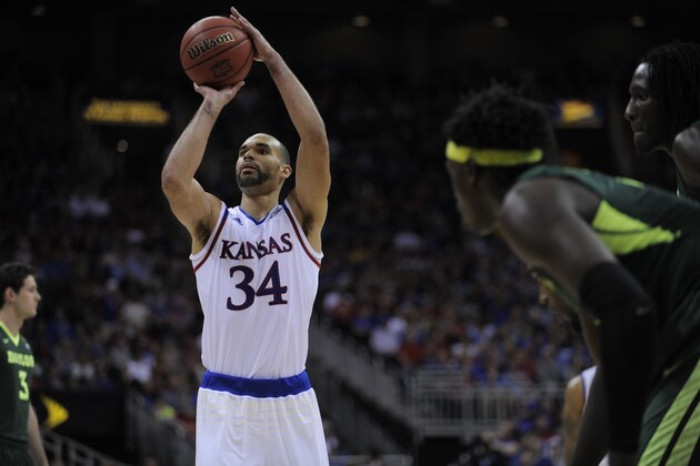 KANSAS CITY, MO - MARCH 11:  Perry Ellis #34 of the Kansas Jayhawks shoots a free throw against the Baylor Bears during the semifinals of the Big 12 Basketball Tournament at Sprint Center on March 11, 2016 in Kansas City, Missouri. (Photo by Ed Zurga/Getty Images)