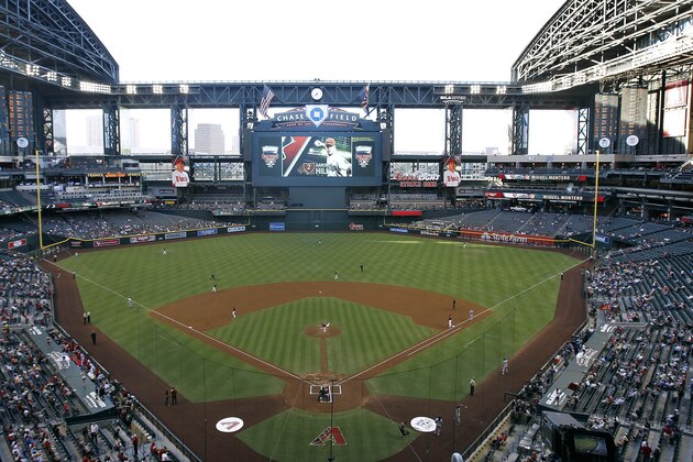 Overview of Chase Field during the first inning of a baseball game between the Arizona Diamondbacks and Milwaukee Brewers on Wednesday, June 18, 2014, in Phoenix. (AP Photo/Ralph Freso)