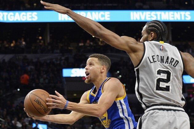 Golden State Warriors guard Stephen Curry, left, shoots against San Antonio Spurs forward Kawhi Leonard during the first half of an NBA basketball game, Saturday, March 19, 2016, in San Antonio. (AP Photo/Darren Abate)