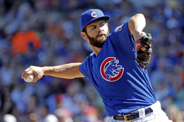 Chicago Cubs' Jake Arrieta throws during the first inning of a spring training baseball game against the Cleveland Indians Wednesday, March 9, 2016, in Mesa, Ariz. (AP Photo/Morry Gash)