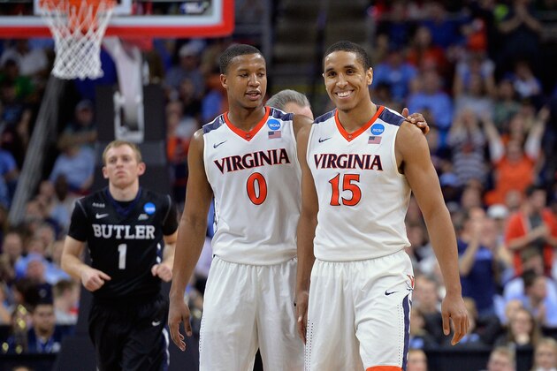 RALEIGH, NC - MARCH 19:  Devon Hall #0 and Malcolm Brogdon #15 of the Virginia Cavaliers celebrate their 77-69 win over the Butler Bulldogs during the second round of the 2016 NCAA Men's Basketball Tournament at PNC Arena on March 19, 2016 in Raleigh, North Carolina.  (Photo by Grant Halverson/Getty Images)