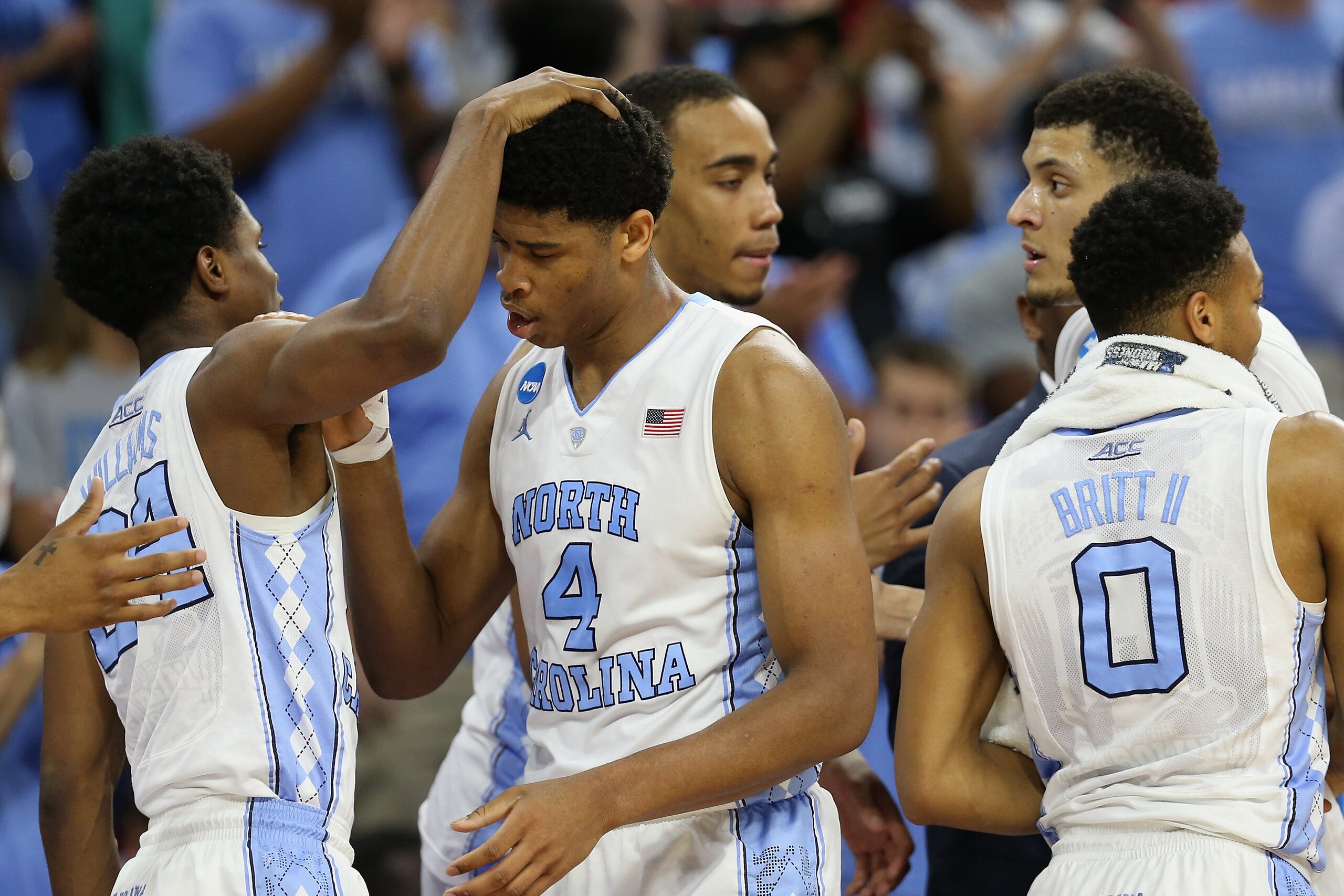 RALEIGH, NC - MARCH 19: Kenny Williams #24, Isaiah Hicks #4, Brice Johnson #11, Justin Jackson #44 and Nate Britt #0 of the North Carolina Tar Heels congratulate eachother after their 85-66 win over the Providence Friars during the second round of the 2016 NCAA Men's Basketball Tournament at PNC Arena on March 19, 2016 in Raleigh, North Carolina. (Photo by Streeter Lecka/Getty Images) RALEIGH, NC - MARCH 19: Kenny Williams #24, Isaiah Hicks #4, Brice Johnson #11, Justin Jackson #44 and Nate Britt #0 of the North Carolina Tar Heels congratulate eachother after their 85-66 win over the Providence Friars during the second round of the 2016 NCAA Men's Basketball Tournament at PNC Arena on March 19, 2016 in Raleigh, North Carolina. (Photo by Streeter Lecka/Getty Images)