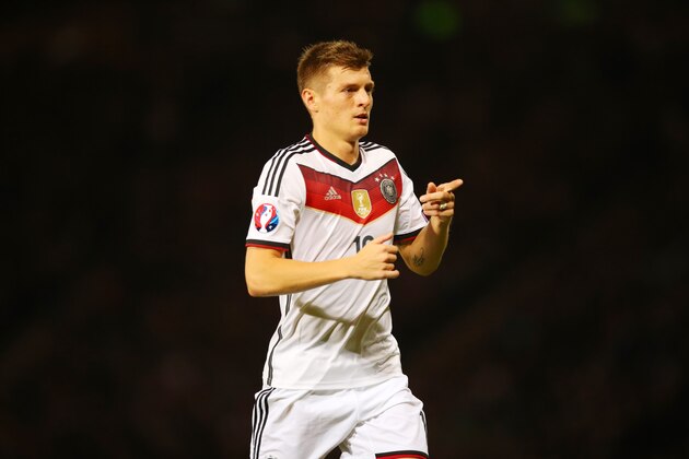 Toni Kroos of Germany gestures during the UEFA Euro 2016 qualifier between Scotland and Germany at Hampden Park in Glasgow, Scotland, on September 7, 2015. AFP PHOTO / IAN MACNICOL        (Photo credit should read Ian MacNicol/AFP/Getty Images)