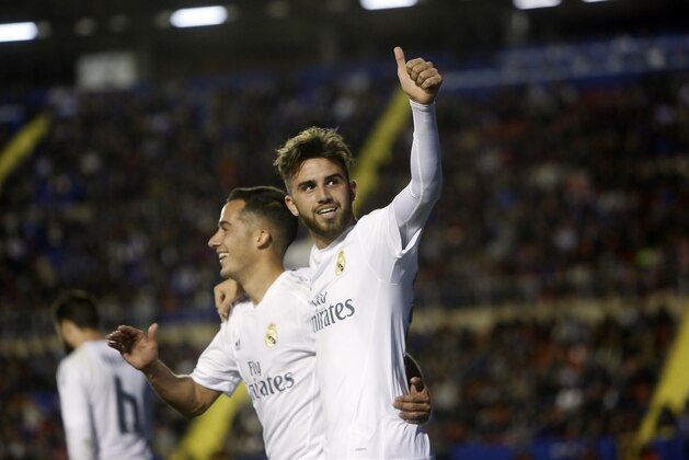 Real Madrid's Borja Mayoral celebrates after scoring against Levante during their La Liga soccer match between Real Madrid and Levante at the Ciutat de Valencia stadium in Valencia, Spain, Wednesday,  March 2, 2016. (AP Photo/Alberto Saiz)