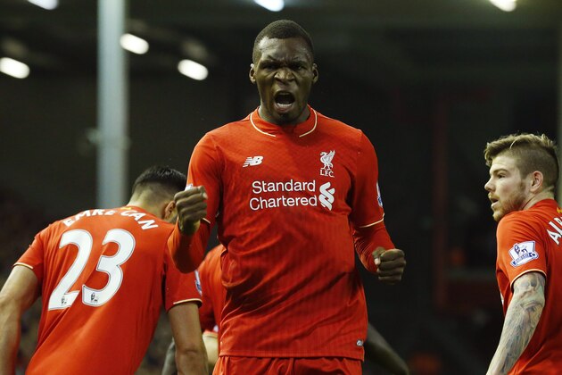 Liverpool's Zaire-born Belgian striker Christian Benteke (C) celebrates scoring the opening goal of during the English Premier League football match between Liverpool and Leicester City at the Anfield stadium in Liverpool, north-west England on December 26, 2015.  AFP PHOTO / LINDSEY PARNABY

RESTRICTED TO EDITORIAL USE. No use with unauthorized audio, video, data, fixture lists, club/league logos or 'live' services. Online in-match use limited to 75 images, no video emulation. No use in betting, games or single club/league/player publications. / AFP / LINDSEY PARNABY        (Photo credit should read LINDSEY PARNABY/AFP/Getty Images)