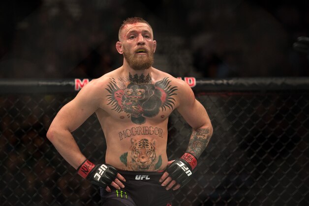 LAS VEGAS, NV - MARCH 5:   Conor McGregor prepares for the second round to begin while facing Nate Diaz in their welterweight bout during the UFC 196 in the MGM Grand Garden Arena on March 5, 2016 in Las Vegas, Nevada. (Photo by Brandon Magnus/Zuffa LLC/Zuffa LLC via Getty Images)
