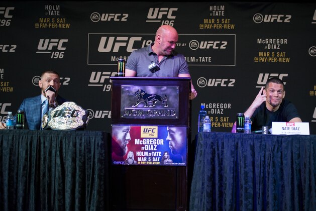 LAS VEGAS, NV - MARCH 3:   (L-R) UFC featherweight champion Conor McGregor and Nate Diaz speak to the media during the UFC 196 Press Conference at David Copperfield Theater in the MGM Grand Hotel/Casino on March 3, 2016 in Las Vegas, Nevada. (Photo by Brandon Magnus/Zuffa LLC/Zuffa LLC via Getty Images)