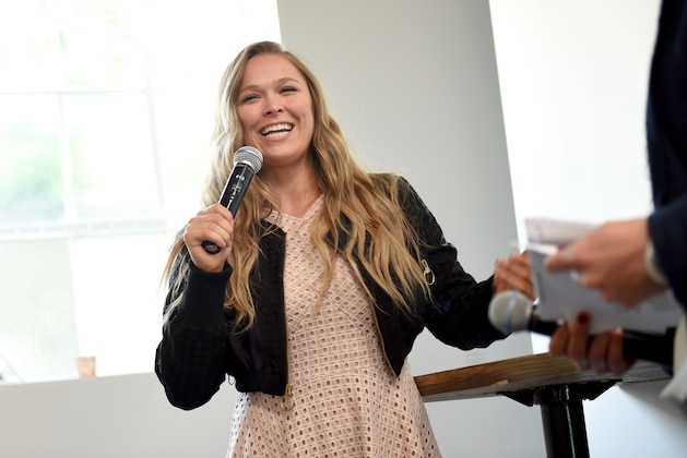 WEST HOLLYWOOD, CALIFORNIA - MARCH 22:  Ronda Rousey speaks during Reebok Women's Luncheon, hosted by Ronda Rousey, on March 22, 2016 in Los Angeles, California.  (Photo by Emma McIntyre/Getty Images for Reebok)