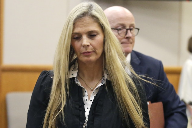 Olympic gold-medal skier Picabo Street leaves the courtroom Tuesday, Feb. 16, 2016, in Park City, Utah. Street appeared in court Tuesday on misdemeanor domestic violence and assault charges. Street is accused of throwing her 76-year-old father down stairs and locking him in a basement during a fight at her home near Park City. Her lawyer contends that she was defending herself after her father attacked her on Dec. 23. (AP Photo/Rick Bowmer, Pool)