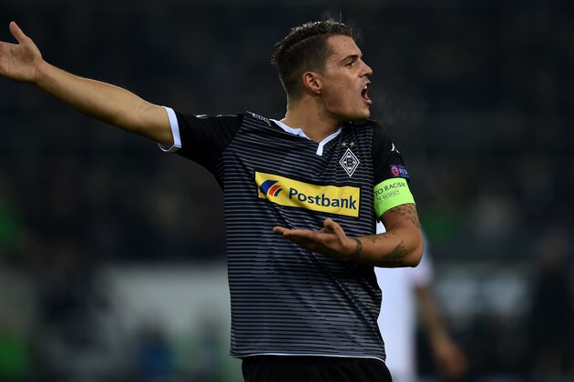 Moenchengladbach's Swiss midfielder Granit Xhaka reacts during the Group D, second-leg UEFA Champions League football match Borussia Moenchengladbach vs FC Sevilla in Moenchengladbach, western Germany on November 25, 2015.  / AFP / PATRIK STOLLARZ        (Photo credit should read PATRIK STOLLARZ/AFP/Getty Images)