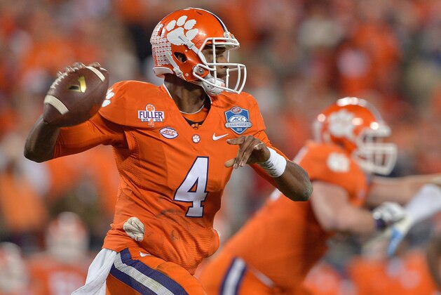CHARLOTTE, NC - DECEMBER 05:  Deshaun Watson #4 of the Clemson Tigers rolls out to pass against the North Carolina Tar Heels during the Atlantic Coast Conference Football Championship at Bank of America Stadium on December 5, 2015 in Charlotte, North Carolina.  (Photo by Grant Halverson/Getty Images)