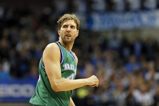 Dallas Mavericks forward Dirk Nowitzki (41) of Germany runs back down the court after taking a shot during an NBA basketball game against the Sacramento Kings on Thursday, March 3, 2016, in Dallas. (AP Photo/Tony Gutierrez)