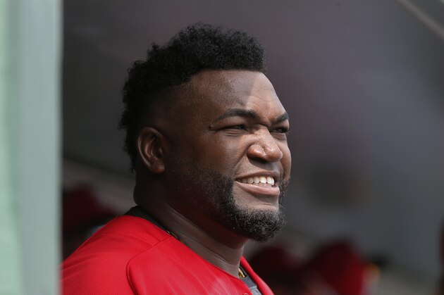 Boston Red Sox's David Ortiz stands in the dugout before an interleague spring training baseball game against the Pittsburgh Pirates on Monday, March 14, 2016, in Fort Myers , Fla. (AP Photo/Tony Gutierrez)