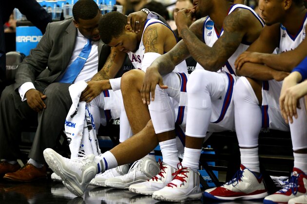 OMAHA, NE - MARCH 22:  Frank Mason III #0 of the Kansas Jayhawks reacts after fouling out of the game against the Wichita State Shockers in the second half during the third round of the 2015 NCAA Men's Basketball Tournament at the CenturyLink Center on March 22, 2015 in Omaha, Nebraska.  (Photo by Ronald Martinez/Getty Images)