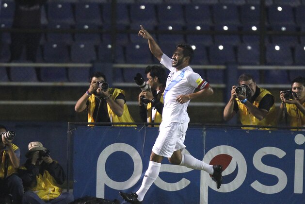 Guatemala's Carlos Ruiz celebrates after scoring against United States during a 2018 Russia World Cup qualifying soccer match at Mateo Flores Stadium in Guatemala City, Friday, March 25, 2016. (AP Photo/ Moises Castillo)