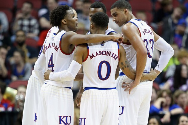LOUISVILLE, KY - MARCH 24:  The Kansas Jayhawks huddle in the second half against the Maryland Terrapins during the 2016 NCAA Men's Basketball Tournament South Regional at KFC YUM! Center on March 24, 2016 in Louisville, Kentucky.  (Photo by Andy Lyons/Getty Images)