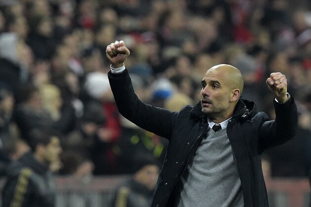 Bayern Munich's Spanish head coach Pep Guardiola celebrates his team's victory after the extra time of the UEFA Champions League, Round of 16, second leg football match FC Bayern Munich v Juventus in Munich, southern Germany on March 16, 2016.
Bayern Munich won 4-2 and qualified for the quarter finals. / AFP / TOBIAS SCHWARZ        (Photo credit should read TOBIAS SCHWARZ/AFP/Getty Images)