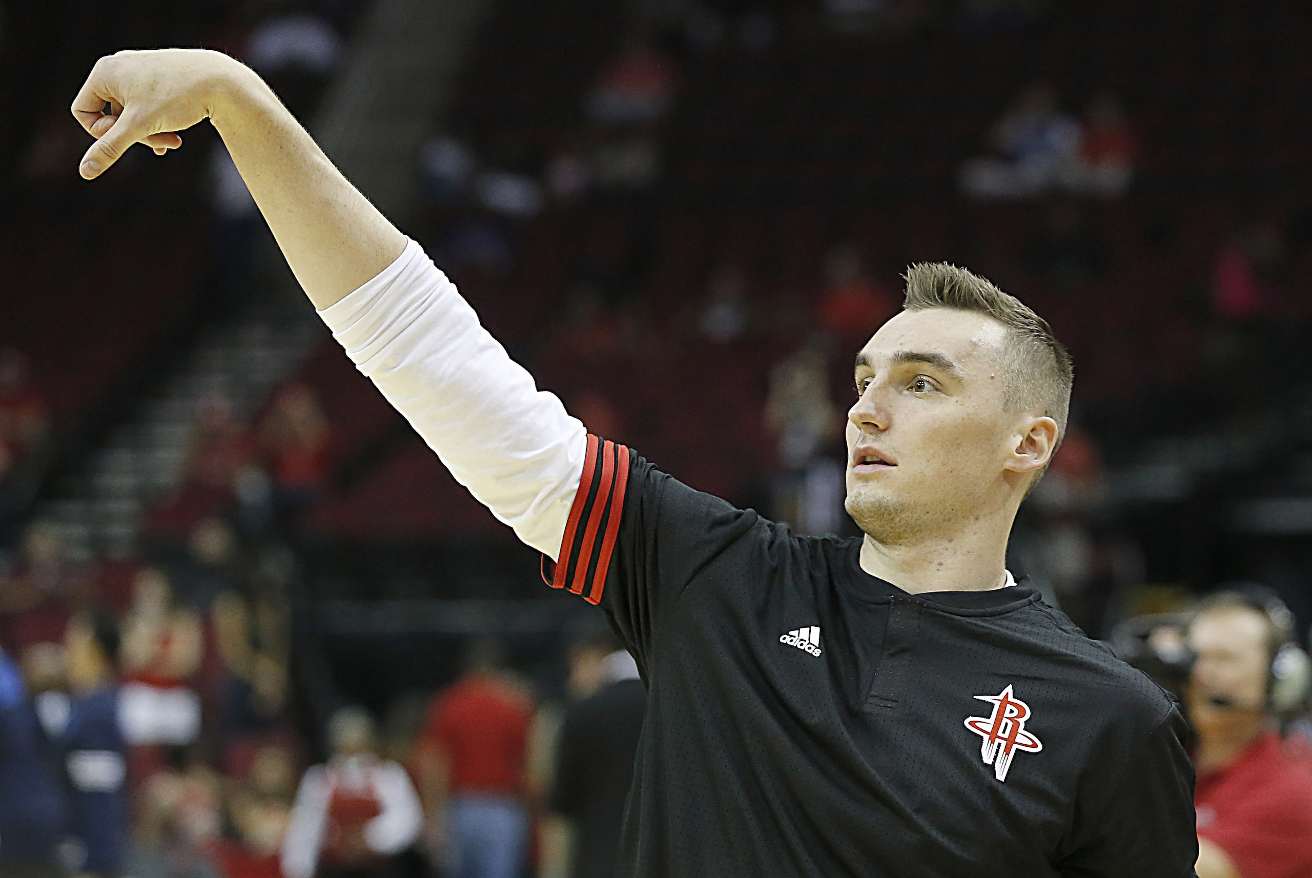 Oct 7, 2015; Houston, TX, USA; Houston Rockets forward Sam Dekker (7) warms up before playing the Dallas Mavericks at Toyota Center. Mandatory Credit: Thomas B. Shea-USA TODAY Sports