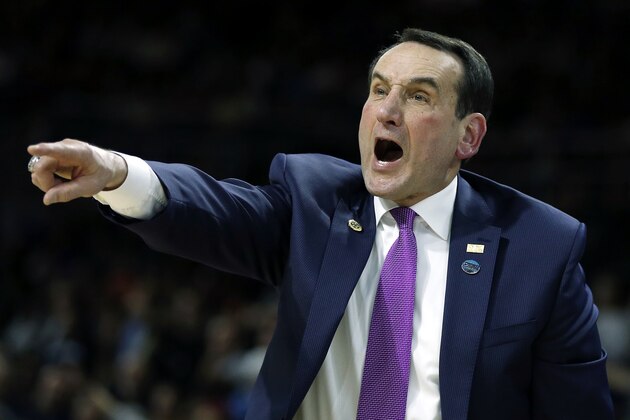 Duke head coach Mike Krzyzewski yells instructions during the second half against Yale in the second round of the NCAA men's college basketball tournament in Providence, R.I., Saturday, March 19, 2016. Duke won 71-64. (AP Photo/Michael Dwyer)