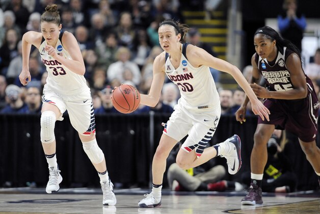 Connecticut’s Katie Lou Samuelson, left, and Breanna Stewart, center, start a fast break in front of Mississippi State’s Chinwe Okorie during the first half of an NCAA college basketball game in the regional semifinals of the women's NCAA Tournament, Saturday, March 26, 2016, in Bridgeport, Conn. (AP Photo/Jessica Hill)